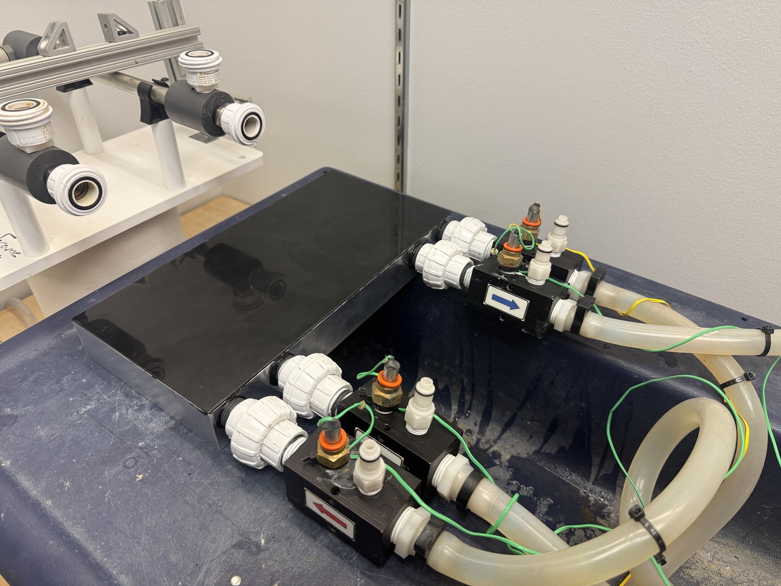 Completed black billet heat exchanger connected to the instrumented water loop