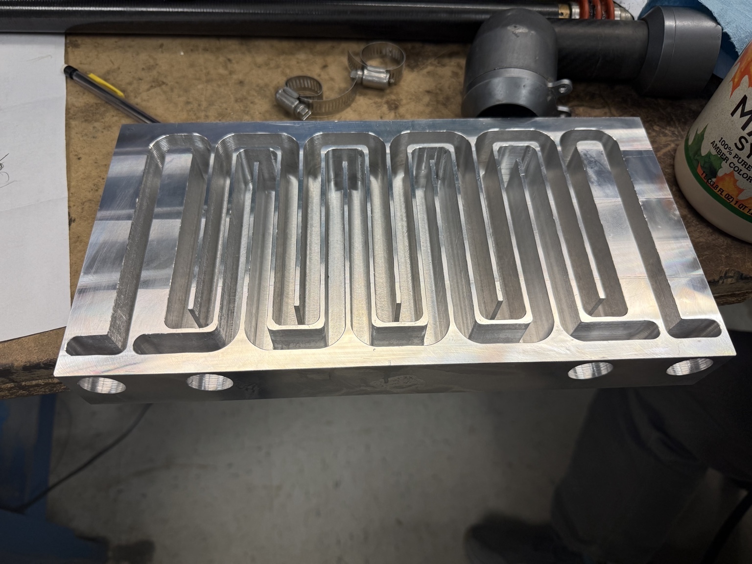Machined serpentine channels in aluminum heat exchanger billet