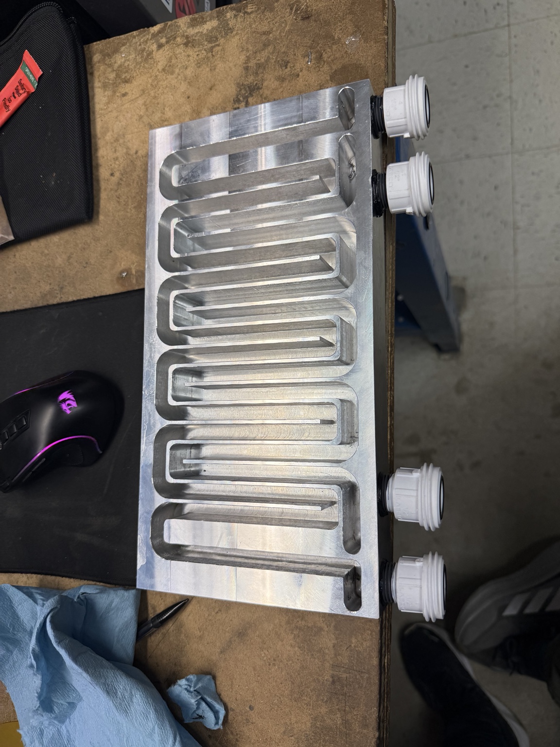 Finished serpentine channels and four side ports in the aluminum billet