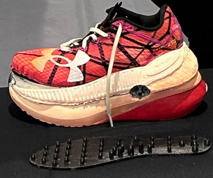 Under Armour recovery shoe with massage insert